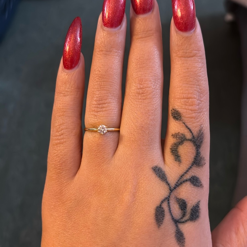 14k Yellow Gold Small Diamond solitaire ring